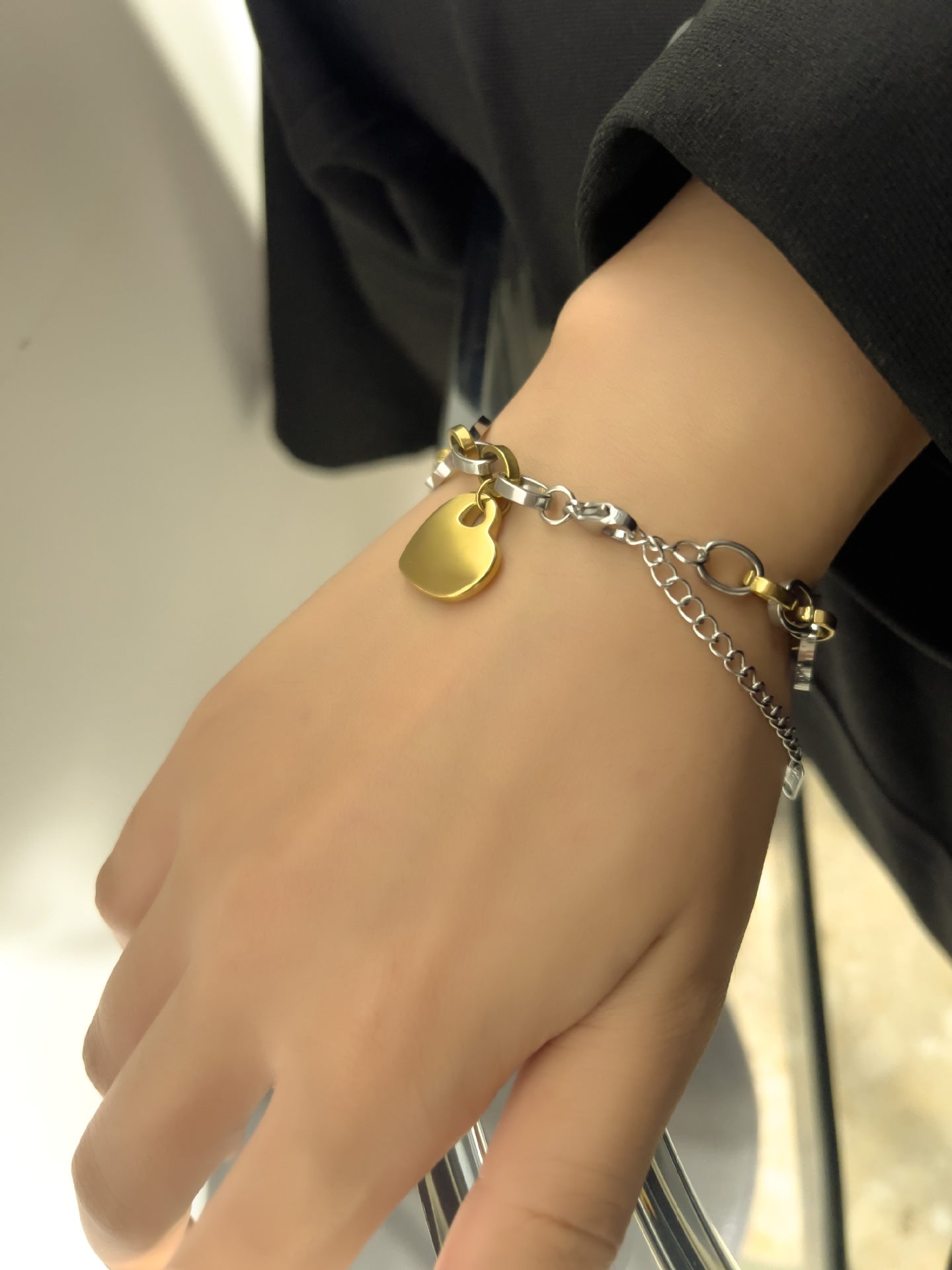 Wholesale Titanium steel gold-plated two-color hollow peach heart chain